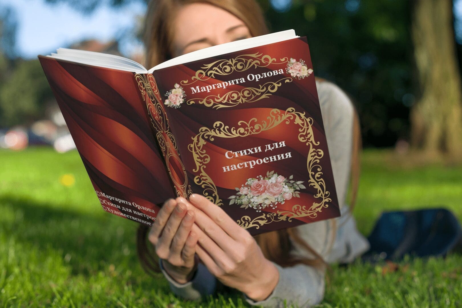 mockup-of-a-woman-reading-a-paperback-book-on-the-grass-3412-el1